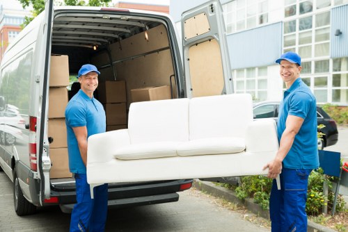 Enfield movers preparing a safe relocation with protective equipment