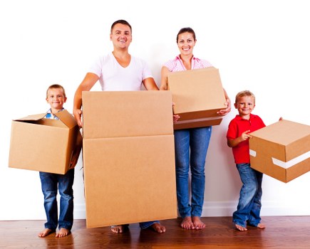 Loading furniture into a truck for an Enfield relocation