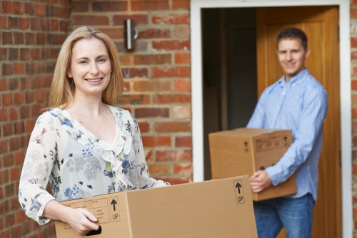 Removal team helping with a house move in Enfield