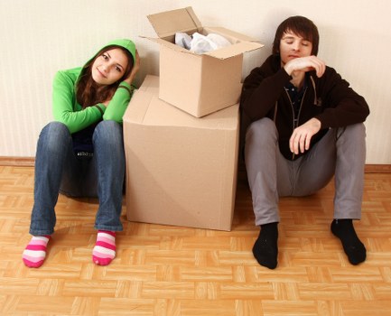 Preparing items for storage with labels and packing in Enfield