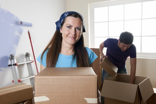 Loading household items into a moving van in Enfield