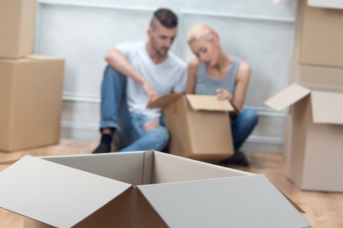Careful loading of dining furniture for a local move in Enfield