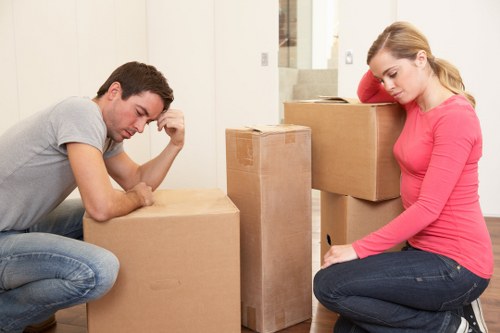 Packed household boxes and furniture ready for a local Enfield move