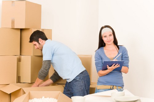 Resolved complaint documents and moving service records on a desk