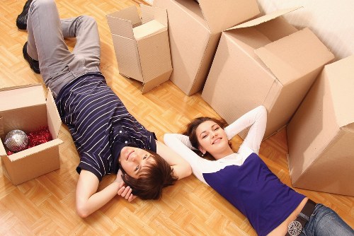 Household furniture being transported by professional movers