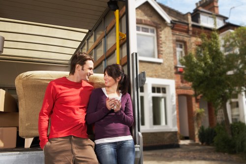 Furniture being moved carefully during a home relocation in Enfield