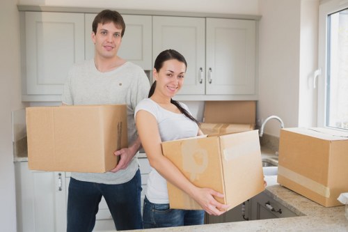 Local movers handling wardrobe removal from an Enfield property